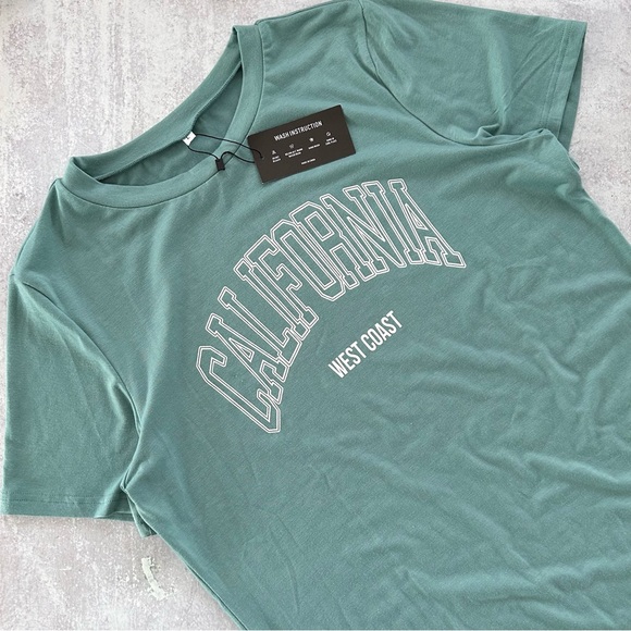 🌼 Avanova CALIFORNIA WEST COAST Graphic Tee Green L NWT - Picture 2 of 6